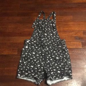 Black flowered pattered shortalls from art class